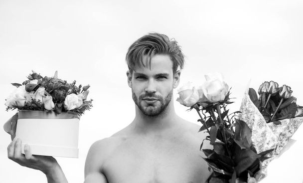 Valentines day. Spring holidays and womans day. Flowers for woman from sexy model man. Flower box. Beauty day concept. - Fotoğraf, Görsel