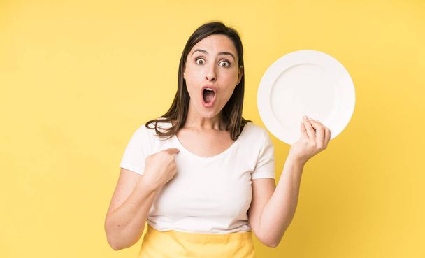 young adult pretty woman home chef with empty plate - Φωτογραφία, εικόνα