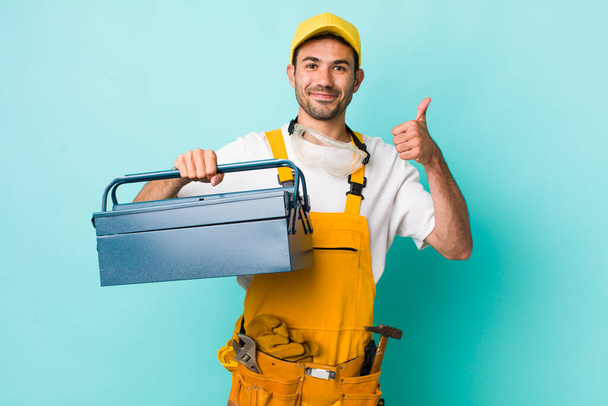 young adult man. plumber and toolbox concept - Foto, immagini