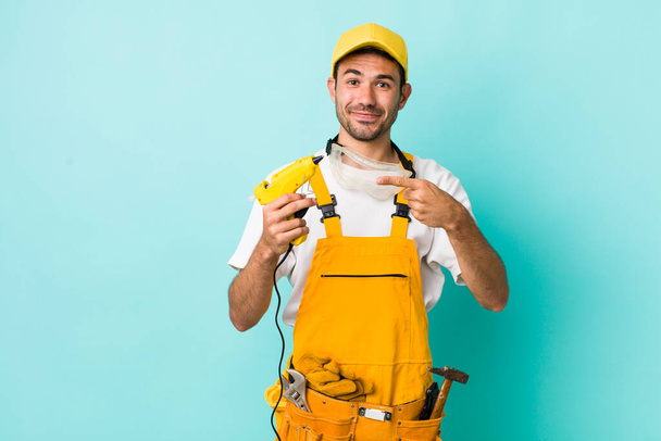 young adult man. handyman or repairman concept - Fotoğraf, Görsel