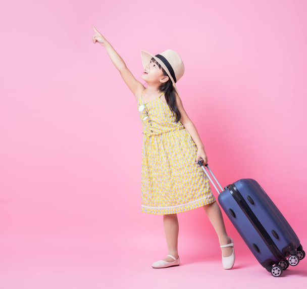 Image of Asian child with suitcase, summer concept - Φωτογραφία, εικόνα