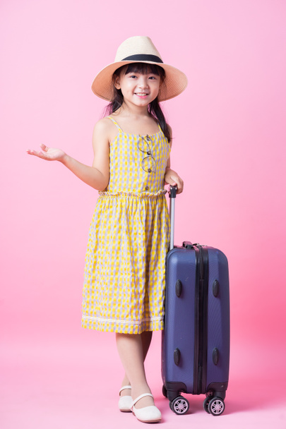 Image of Asian child with suitcase, summer concept - Foto, Imagen
