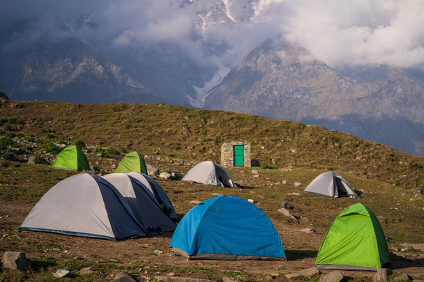 Camping in triund hill top at mckleodganj, dharamshala. One of the beautiful trek of Dharamshala. - Foto, imagen