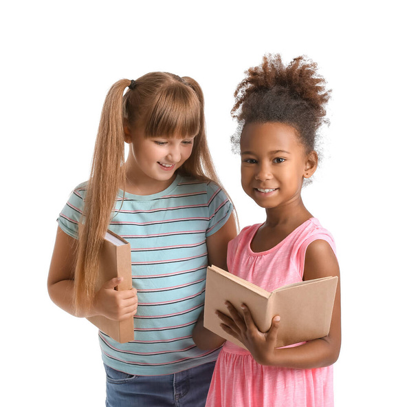 Little girls with books on white background - Φωτογραφία, εικόνα