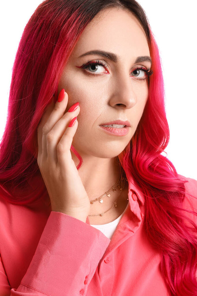Beautiful woman with bright pink hair on white background, closeup - Foto, imagen