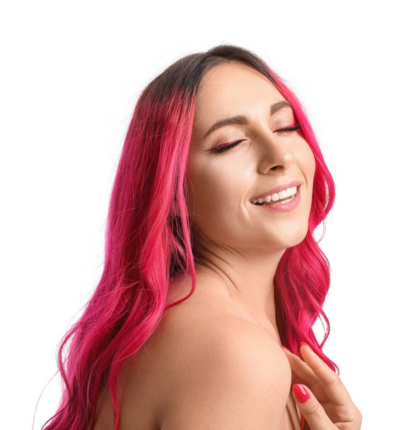 Beautiful woman with bright pink hair on white background, closeup - Fotó, kép
