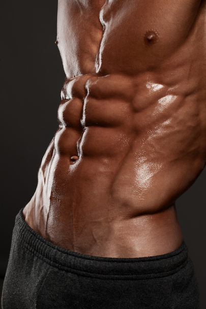 Muscled male model in studio - Фото, зображення