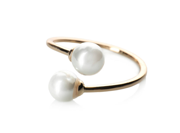 Elegant golden ring with pearls isolated on white - Foto, Imagen