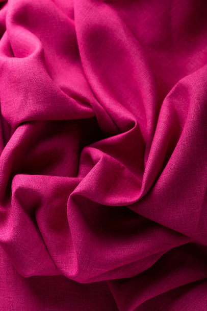 Texture with fuchsia linen fabric, selective focus image - Foto, Bild