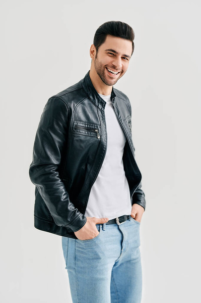Portrait of happy smiling man posing on studio white background - Zdjęcie, obraz