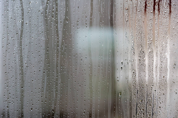 natural behind the wet glass with water drops on the glass background - Foto, imagen