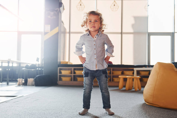 Child in casual clothes have fun in playroom at weekend time. - Fotoğraf, Görsel