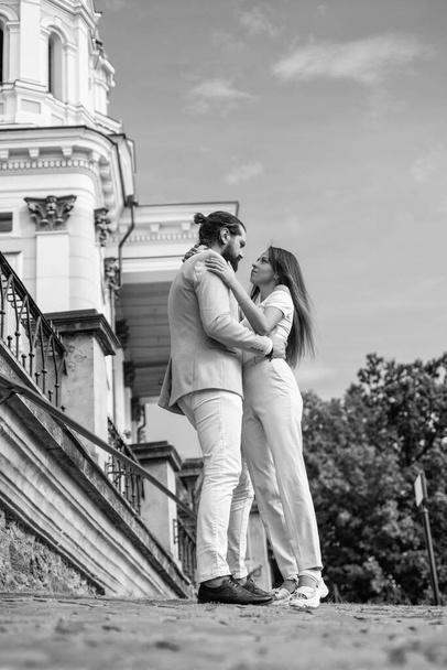 This is love. couple in love. feel the romance. first meet date. celebrate romantic holiday. family anniversary. pure feelings. bearded man hipster hug sexy woman. guy embrace his girl outdoor - Fotoğraf, Görsel