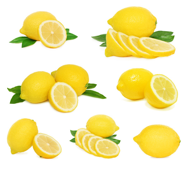 Set whole and sliced lemons with green leaves (isolated) - Valokuva, kuva