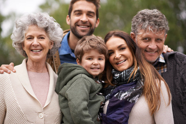One big happy family. Portrait of a happy multi-generation family standing outdoors. - Φωτογραφία, εικόνα