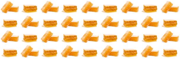 Many organic honey combs on white background - Foto, afbeelding