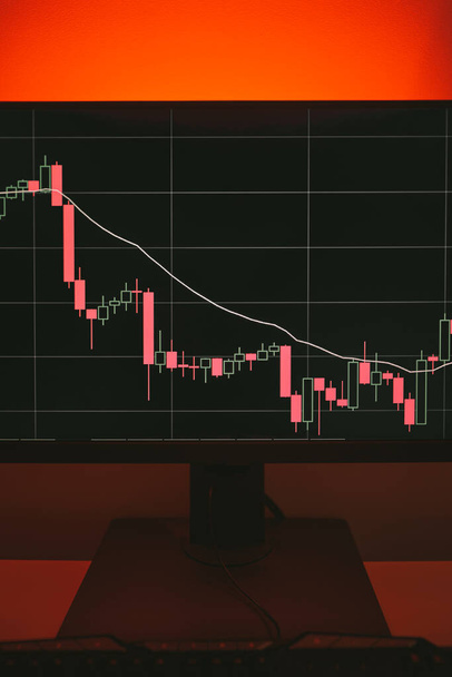 Technical price graph and indicator, red and green candlestick chart on red background. Concept of market volatility, up and down trend. Stock trading, crypto currency background. - Photo, Image