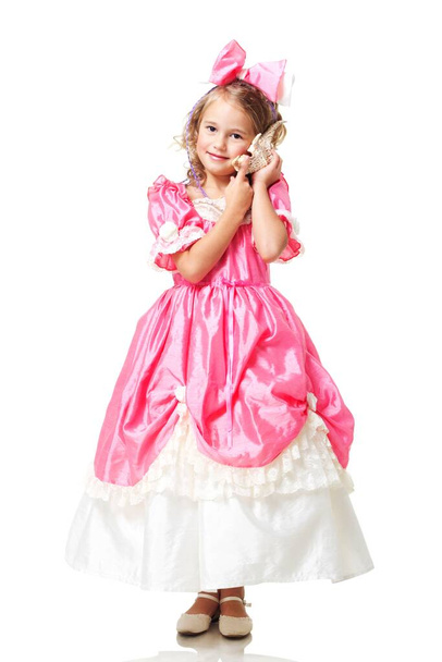Little Beauty Queen. Young girl as magic fairy on white background - Foto, Bild