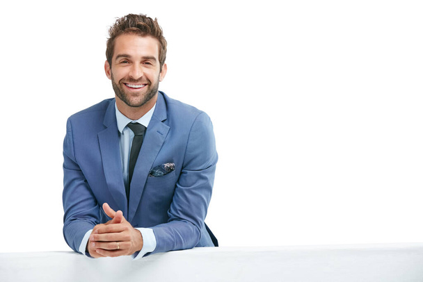 Nothing says success like confidence. Studio portrait of a confident businessman posing against a white background. - Foto, Imagem