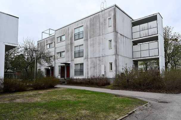 old concrete house in a residential area in Helsinki, Finland - 写真・画像