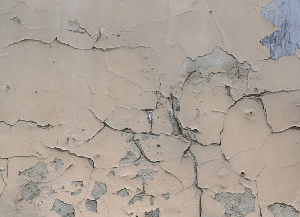 Texture of an old wall with cracks and scuffs - 写真・画像
