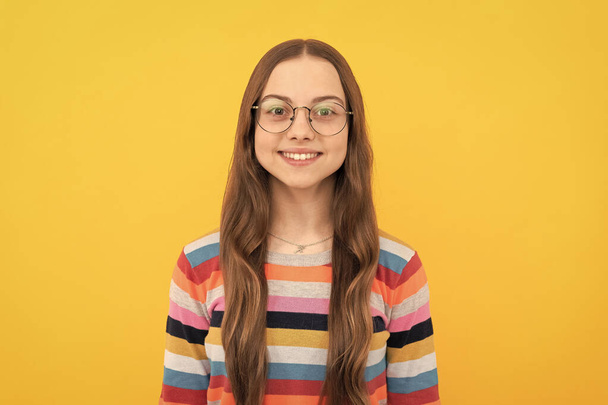 happy teen girl look through eyeglasses. vision acuity. eyesight. vision correction - Φωτογραφία, εικόνα