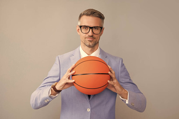 sport and business success. activity for confident boss. mature businessman in formalwear - Fotografie, Obrázek