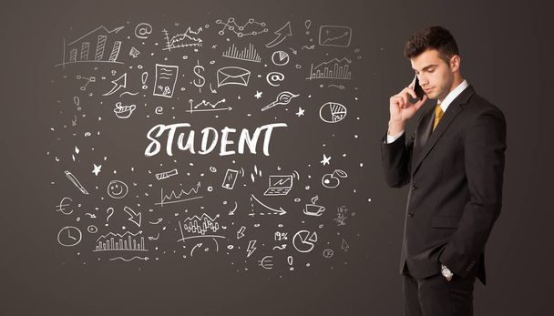 Businessman thinking with STUDENT inscription, business education concept - Photo, image