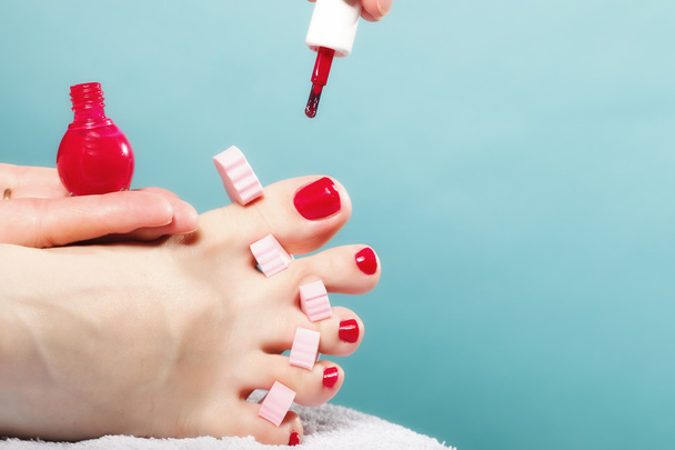 Feet with red toenails - Foto, Imagem