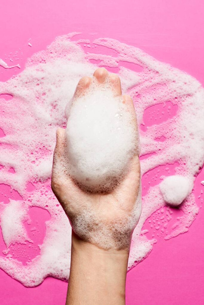 Beauty foam in hand of woman - Foto, Imagen