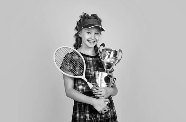 sport success. happy teen girl in sportswear won the prize. championship cup. - Foto, Imagem