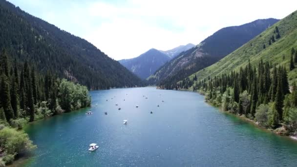 Kolsai mountain lake and green forest. Top view. - Materiał filmowy, wideo