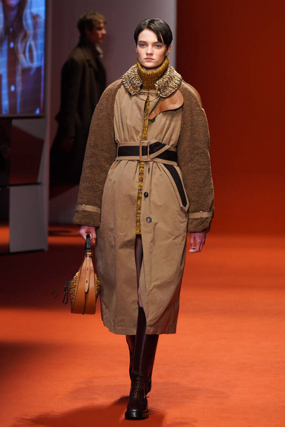 MILAN, ITALY - FEBRUARY 25: A model walks the runway at the Tod's fashion show during the Milan Fashion Week Fall/Winter 2022/2023 on February 25, 2022 in Milan, Italy. - Фото, изображение
