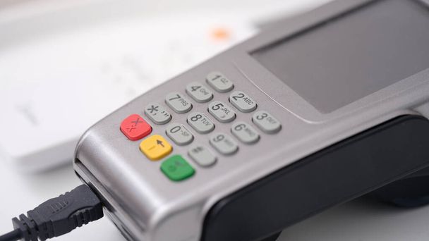 POS terminal for payment with wire closeup - Foto, immagini