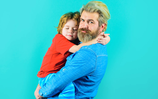 Fathers day. Father and little son hugging. Family relationships. Parenthood and childhood concept. - 写真・画像