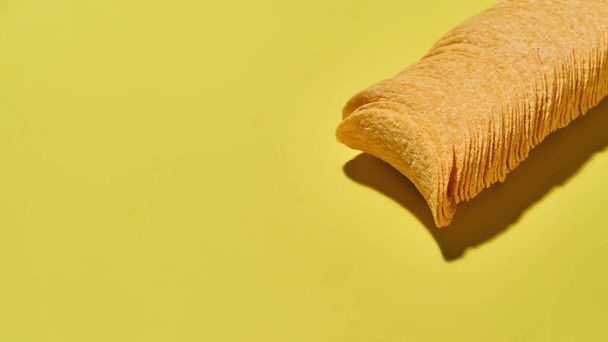 Cropped of row of appetizing potato chips - Photo, Image