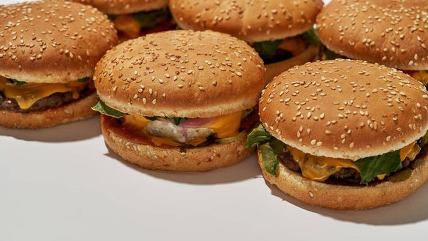 Cropped view of collection of classic burgers - Fotó, kép