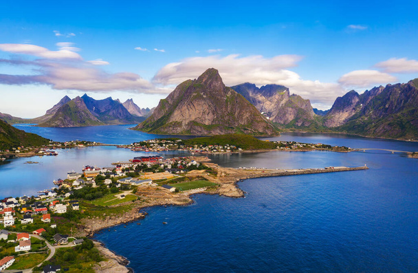Reine fishing village surrounded by high mountains and fjords on Lofoten islands - Foto, immagini