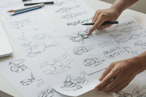 Animator designer Development designing drawing sketching development creating graphic pose characters sci-fi robot Cartoon illustration animation video game film production , animation design studio. - Fotó, kép