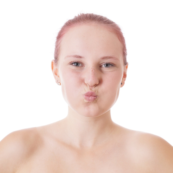 young woman with puffed cheeks - Photo, Image
