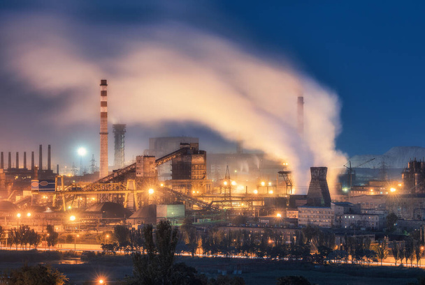 Azovstal in Mariupol, Ukraine before war. Steel plant at night - Фото, изображение