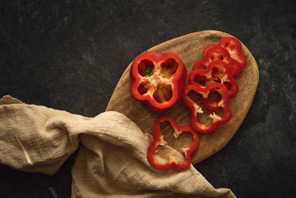 red sweet pepper sliced into rings - Fotó, kép