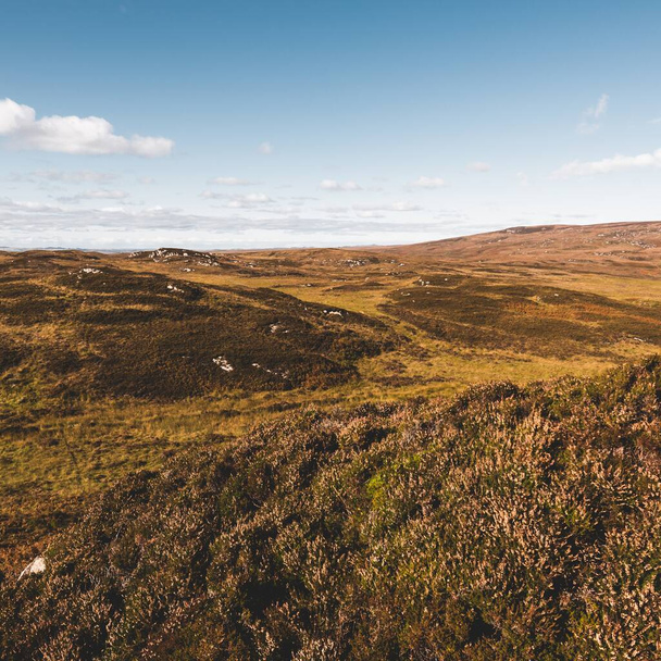 Panoramic view of the valleys hills and rocky shores of Isle of Islay. Inner Hebrides, Scotland, UK. Idyllic landscape. Travel destinations, national landmark, recreation, environmental conservation - Fotografie, Obrázek