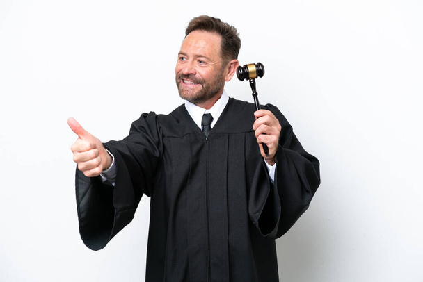 Middle age judge man isolated on white background giving a thumbs up gesture - Photo, Image