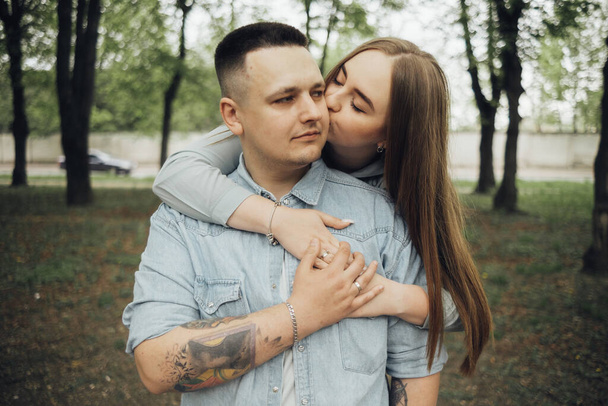 loving couple walking in ukrainian park and city - Foto, immagini