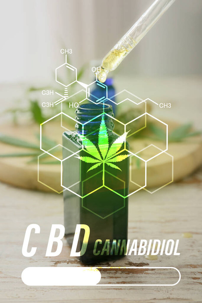 Bottle and pipette with dripping CBD oil on table - Foto, Bild