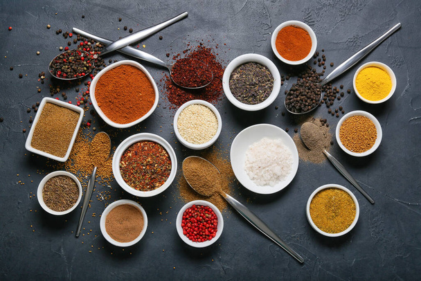 Set of aromatic spices on dark background - Photo, Image