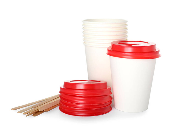 Takeaway paper cups and spoons on white background - 写真・画像