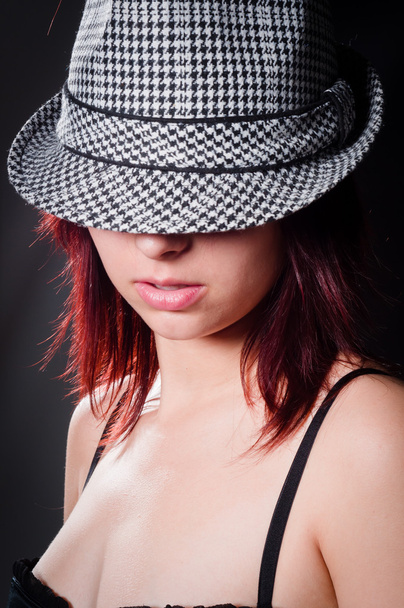 Vintage photo of a beautiful girl in sylish hat - Fotografie, Obrázek