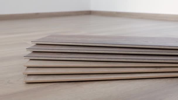 Wooden floor samples of laminate. Timber, laminate flooring. - Video